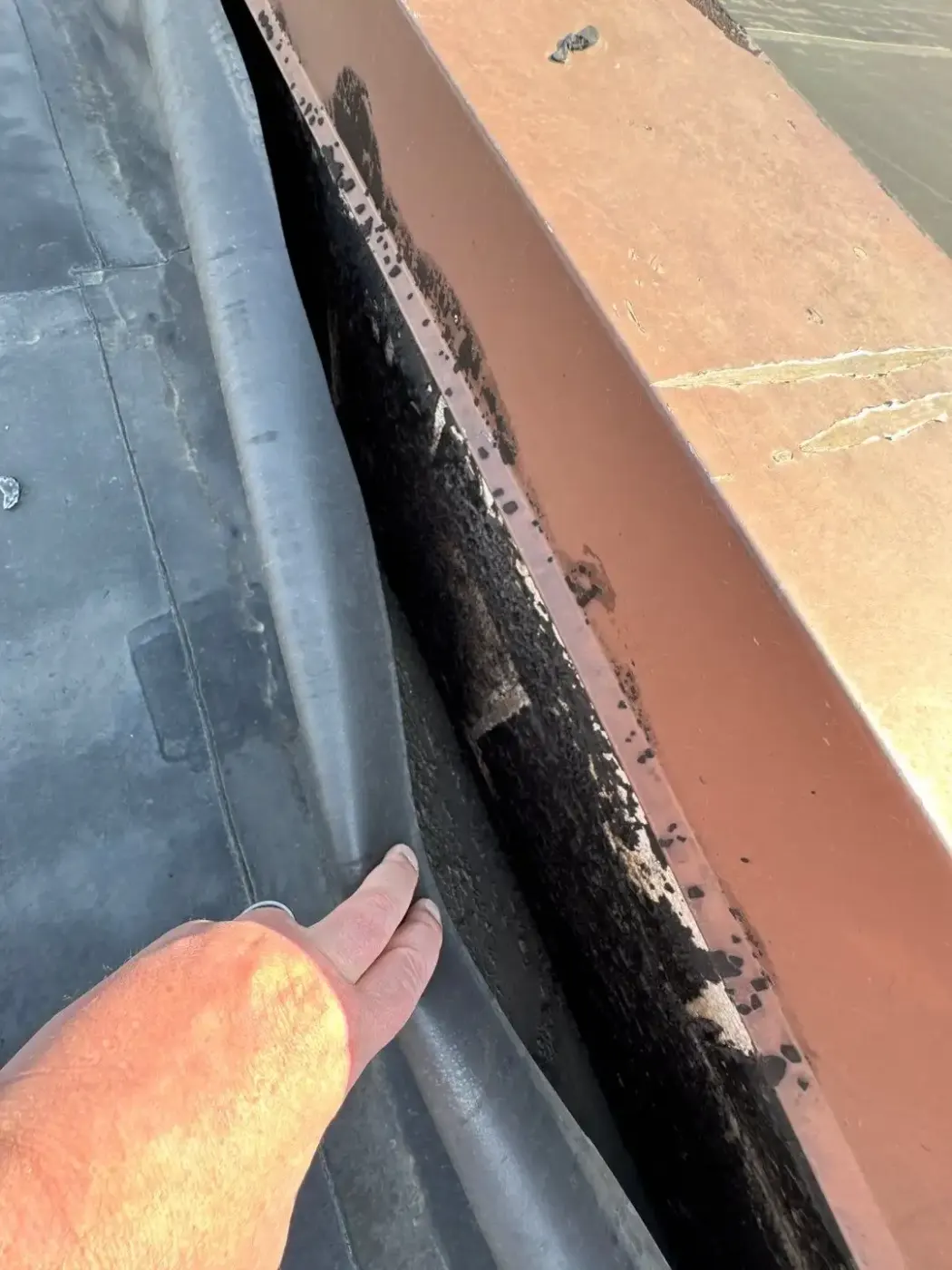 Tarping and dry-in on a Garrett commercial roof