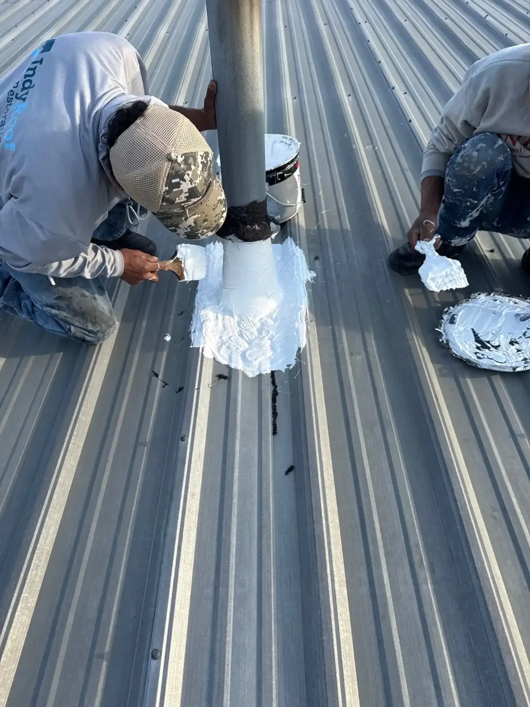 Tarping and dry-in on a Garrett commercial roof
